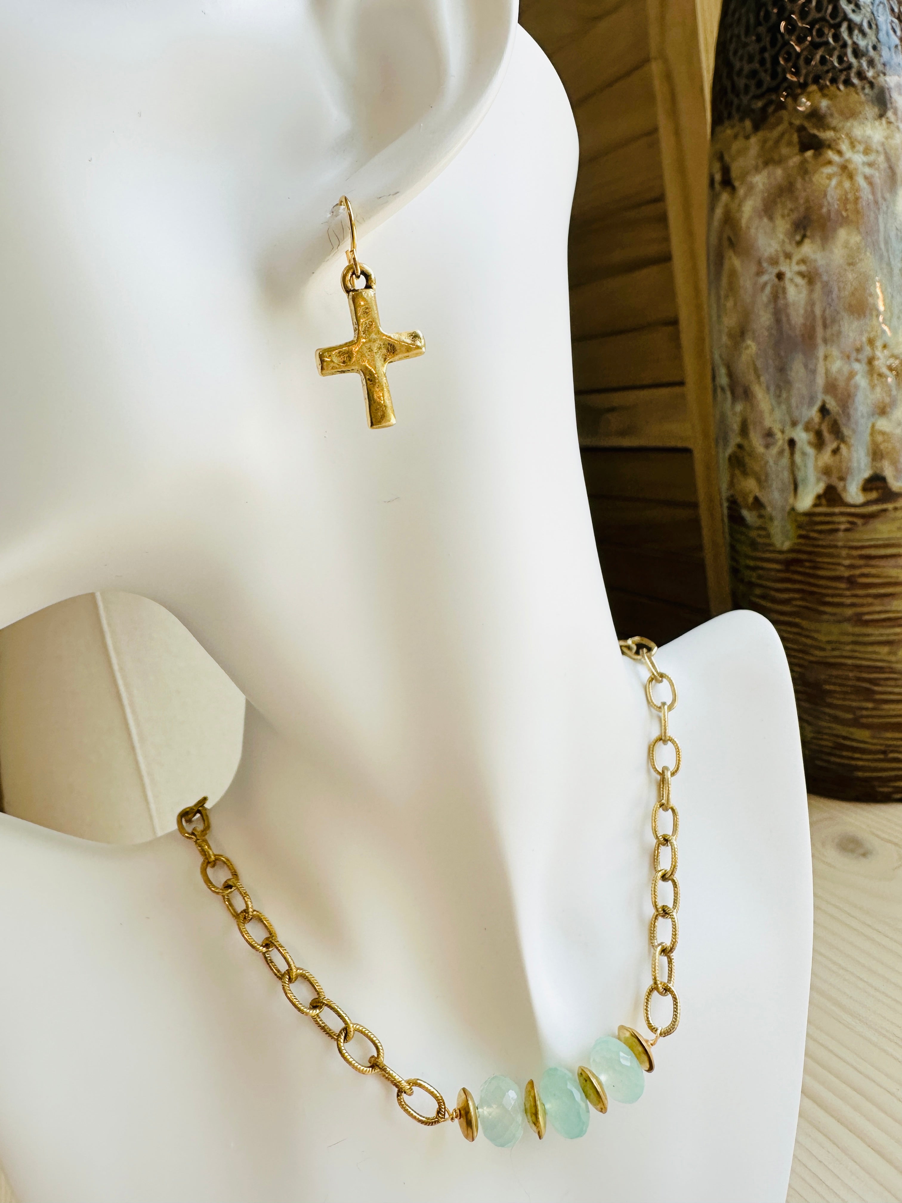 Small gold store cross earrings